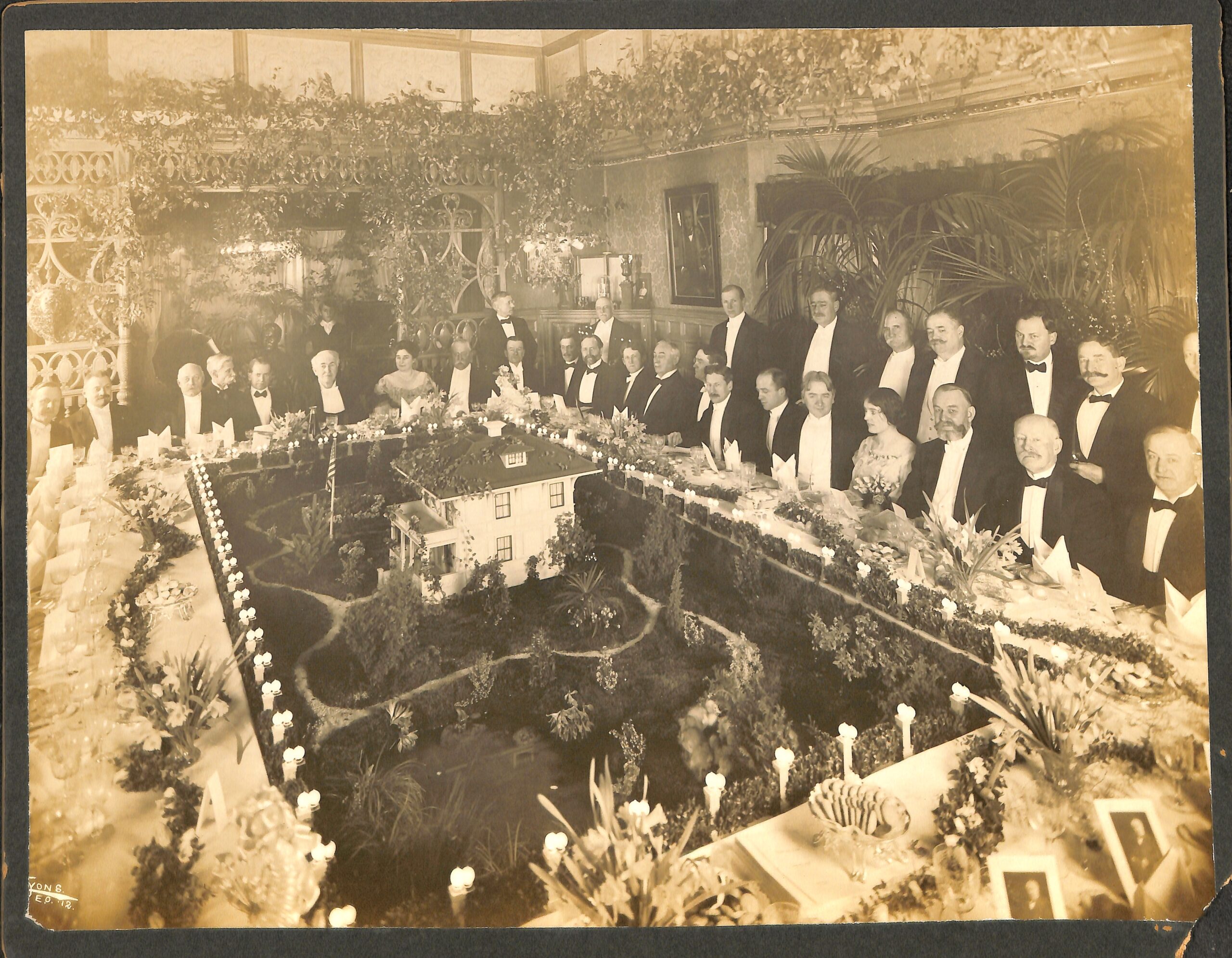 Model of Edison’s concrete house in the centre of his sixty-fifth birthday dinner table in 1912