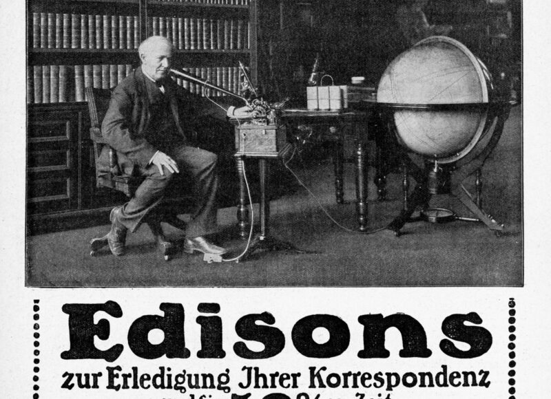 A 1911 advertisement showing Thomas Edison dictating with an Edison business phonograph