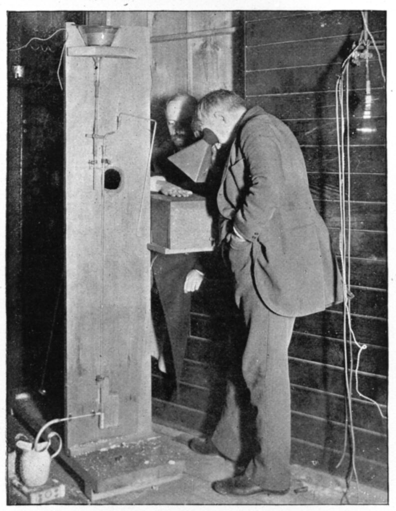 Thomas Edison examining a hand with an early calcium tungstate fluoroscope in 1896