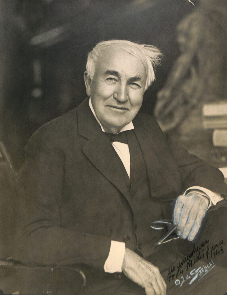 Thomas Edison seated in his West Orange library in 1926