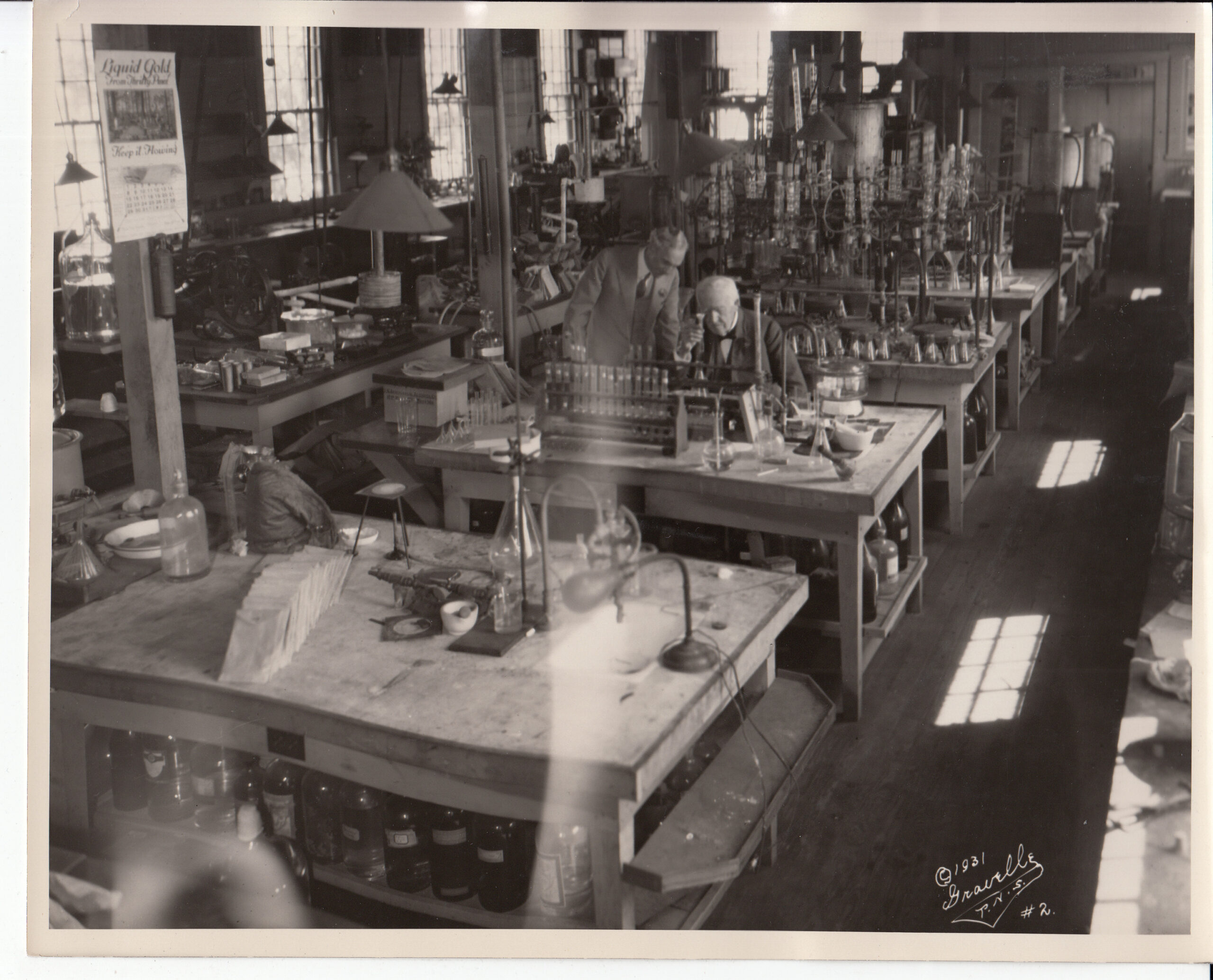 Henry Ford and Thomas Edison working inside the Fort Myers laboratory in March 1931