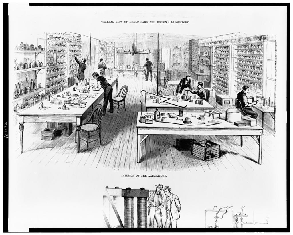 Interior of Thomas Edison’s Menlo Park laboratory with benches and experimental apparatus around 1880