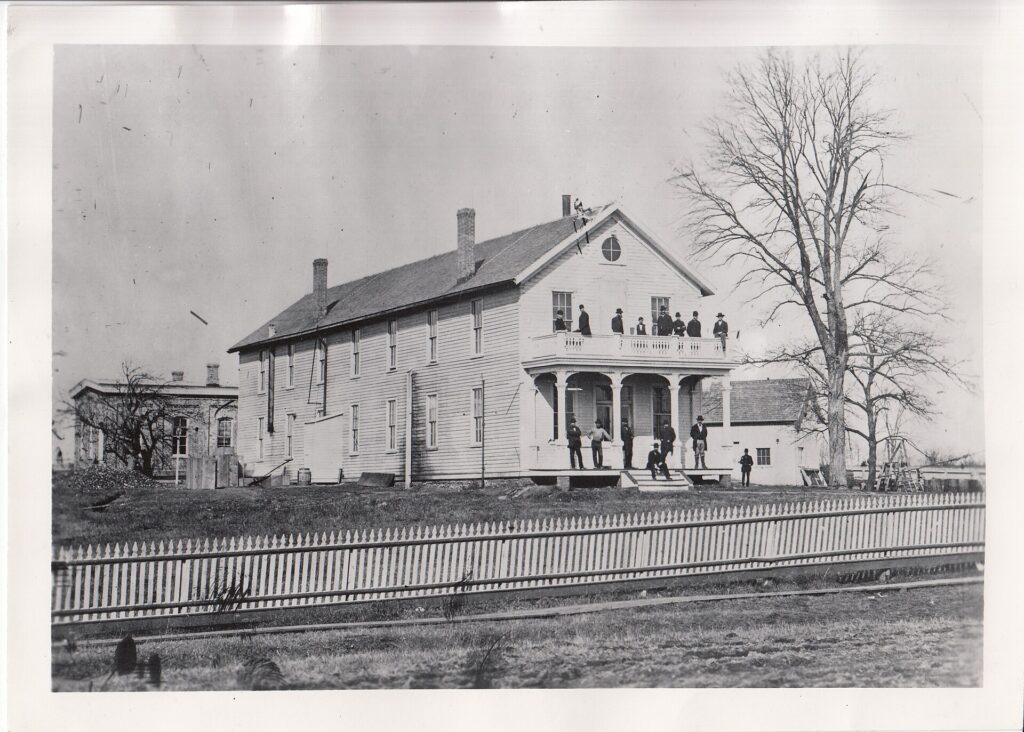 Thomas Edison’s Menlo Park laboratory staff gathered outside the main building around 1880