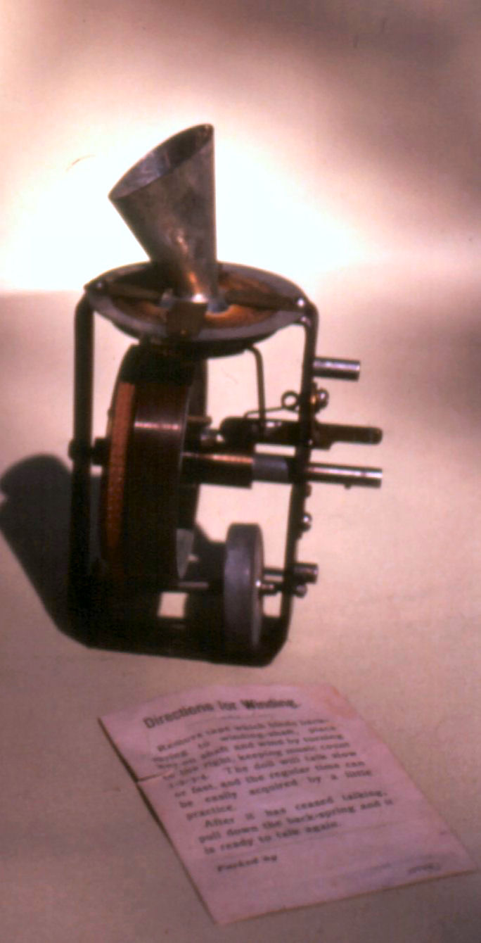 Small wax cylinder fitted to the phonograph mechanism of an Edison talking doll