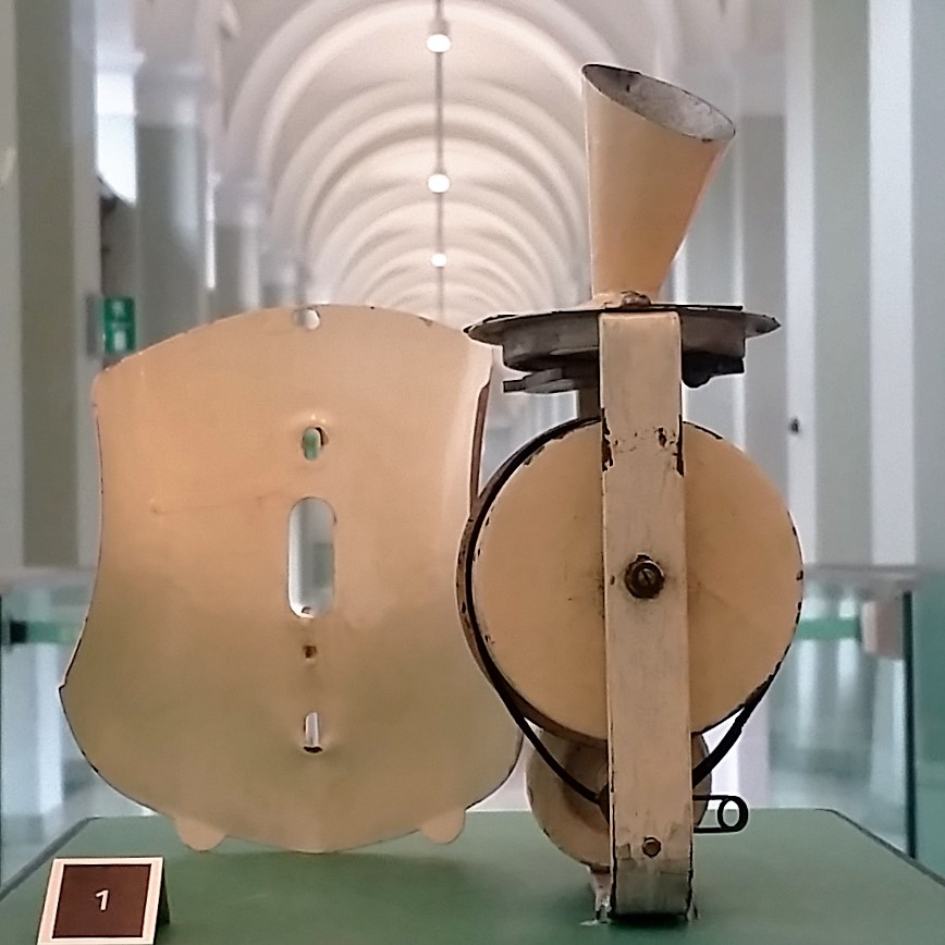 Compact phonograph mechanism removed from an Edison talking doll