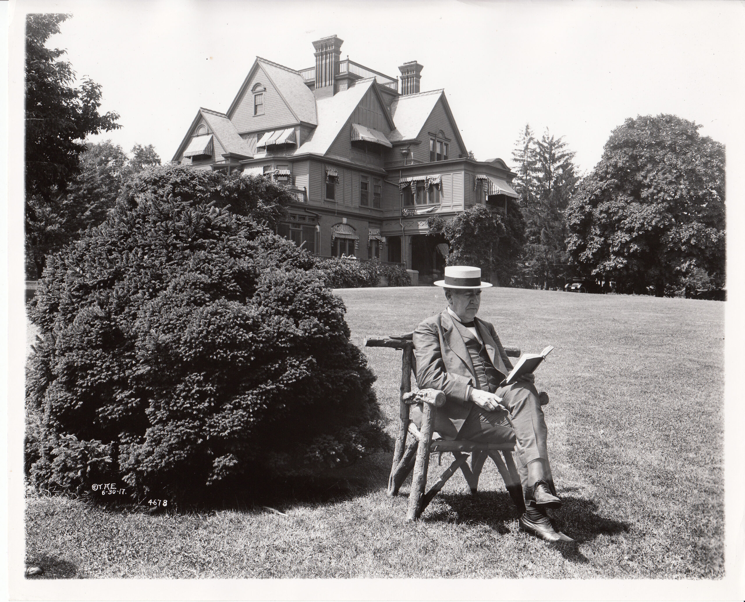 Thomas Edison reading at his Glenmont home in 1917